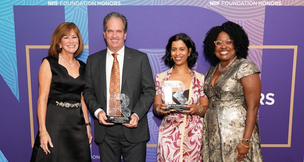 PwC’s Barbra Bukovac, Five Below’s Joel Anderson (holding trophy), Neela Montgomery (holding trophy), Colleen Taylor of American Express 