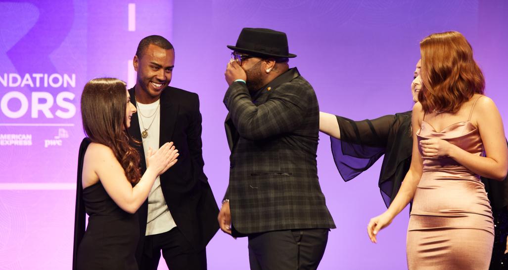 Robert Davison Long onstage with other finalists